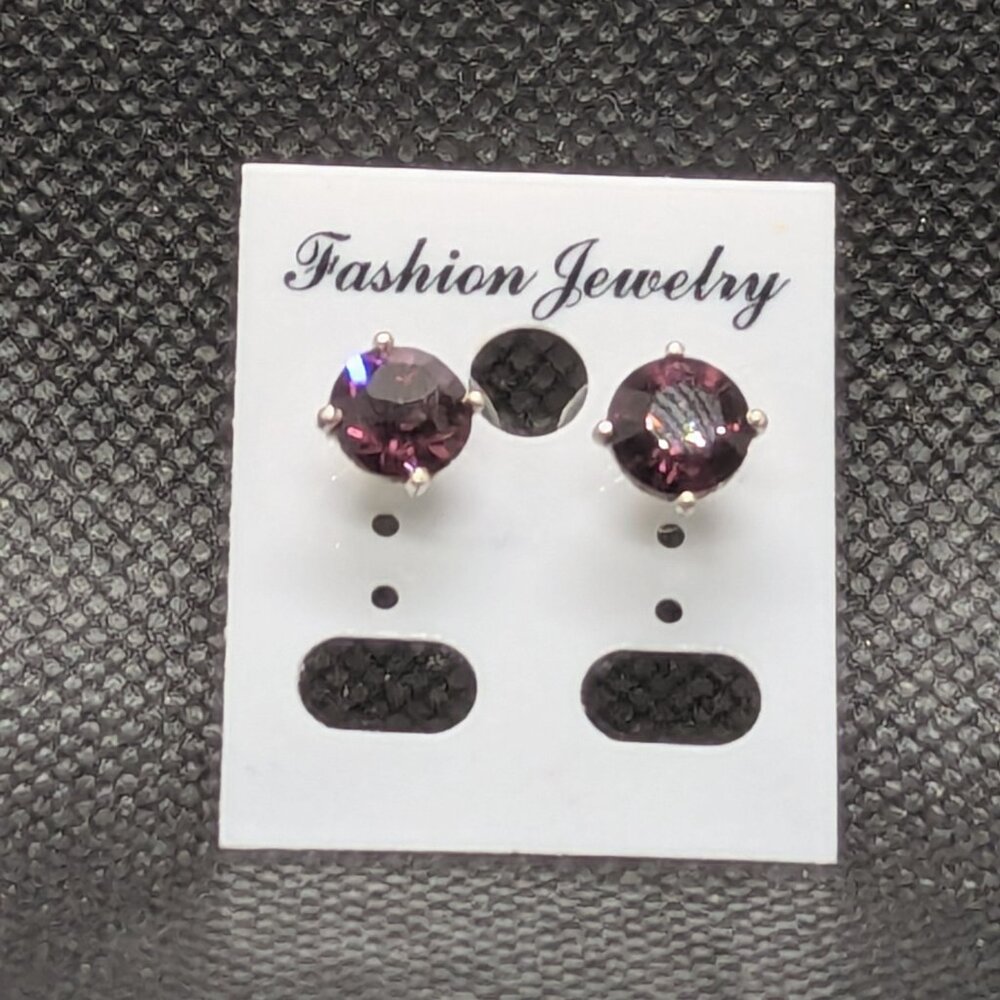 Red zircon in a sterling silver base